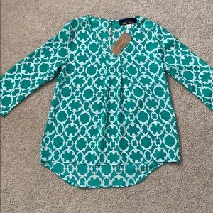 Francesca’s blue rain patterned dress shirt